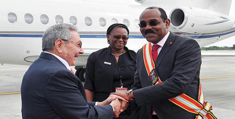 Upon his arrival in Saint Mary's, President Raul Castro is welcomed by Antigua and Barbuda Prime Minister Gaston Browne.