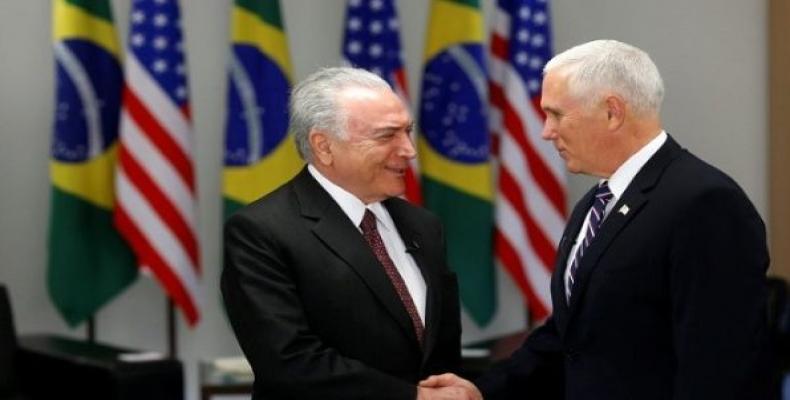 Brazil's un-elected president Michel Temer greets U.S. VP Mike Pence.   Photo: Reuters