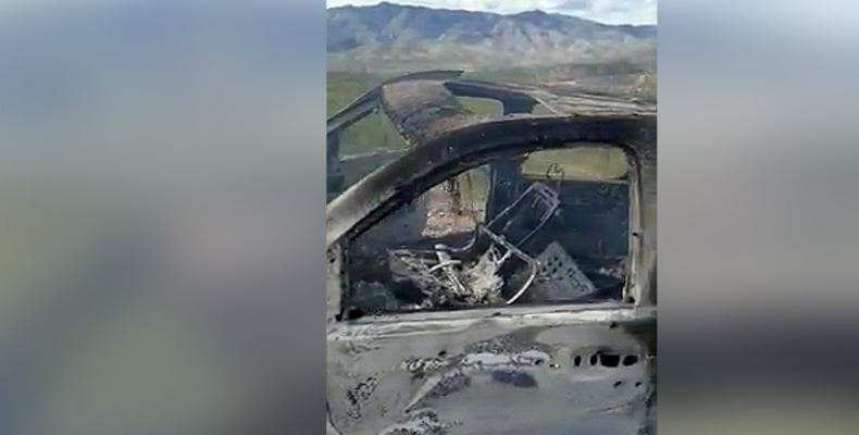 Burnt wreckage of vehicle transporting Mormon family.  (Photo: Reuters)