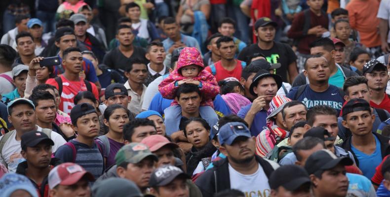 Migrant caravan traveling through Mexico to the U.S.   Photo: Reuters