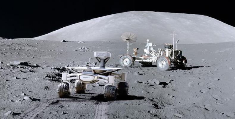 Artist's rendering of PTScientists’ Audi lunar quattro rover driving to the Apollo 17 lunar roving vehicle on the moon.  Photo: PTScientists