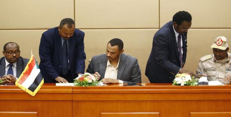 Sudan's military, civilian parties and protest groups signed a three-year power-sharing deal in August [Ashraf Shazly/AFP]