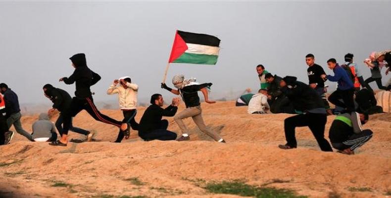 Palestinians participate in a rally in Gaza Strip.  (Photo: AFP)