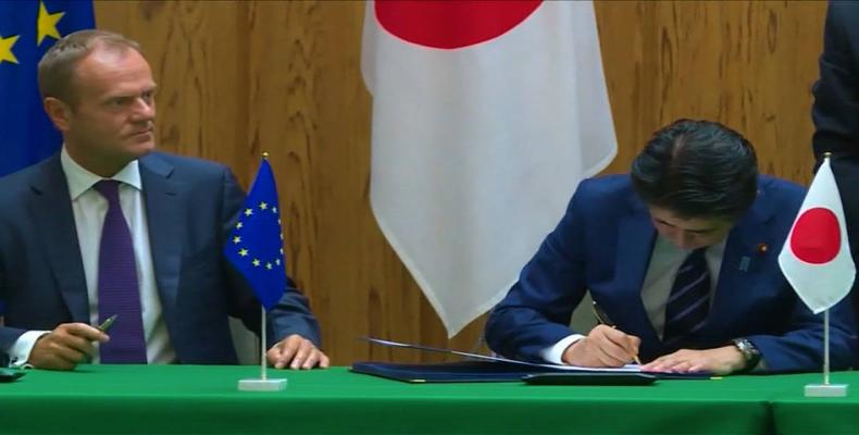 EU and Japan sign one of world’s largest trade-acts.   Photo: AP