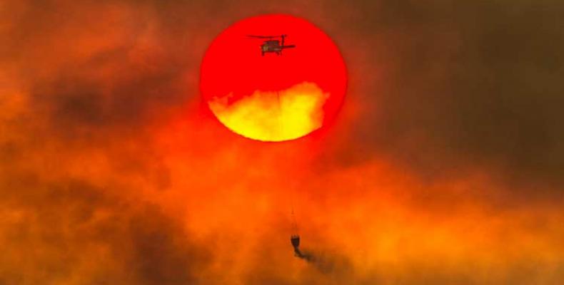 Consideran expertos que cambio climático empeora incendios en California. Foto:PL.