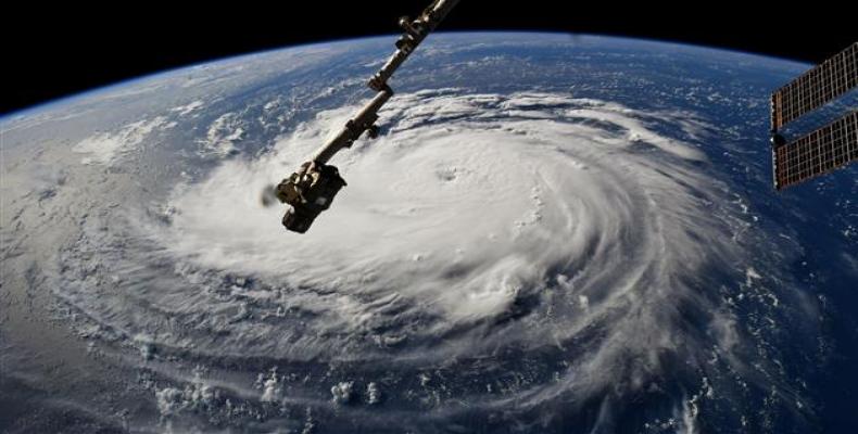 NASA handout photo shows a view from the International Space Station of Hurricane Florence off the US ٍٍٍEast Coast in the Atlantic Ocean, on September 10, 2018