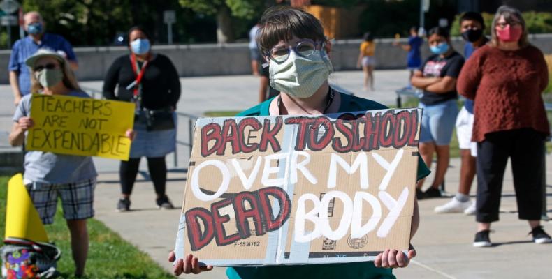 Protest against schools reopening in Salt Lake City, Utah.  (Photo: AP Photo/Rick Bowmer)