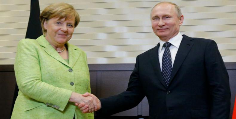 Presidente de la Federación de Rusia, Vladímir Putin, y la canciller alemana, Ángela Merkel